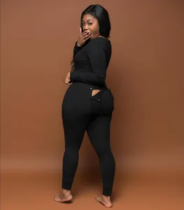 Black long-sleeved loungewear jumpsuit for women featuring a functional button flap