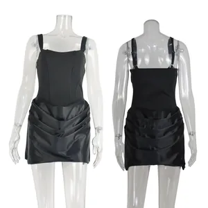 Front and back view of a black square neck strap mini dress with draped skirt detail.