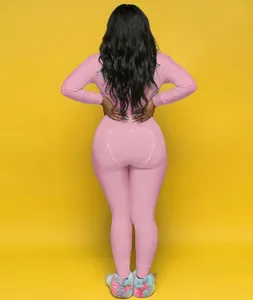 Back view of pink long sleeve jumpsuit pajamas with functional buttoned butt flap