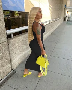 Model wearing a sexy black rib-knit sleeveless U-neck slim fit long maxi dress