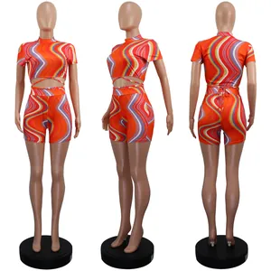 Three-way view of women's colorful wavy stripe two-piece set with waist ties