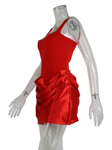 Vibrant red mini bodycon dress featuring elegant side draping and sleek shoulder straps detail.