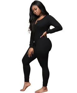 Side view of black long-sleeved buttoned jumpsuit for women's loungewear