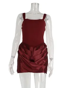 Elegant burgundy bodycon mini dress featuring wide straps and a pleated satin draped skirt