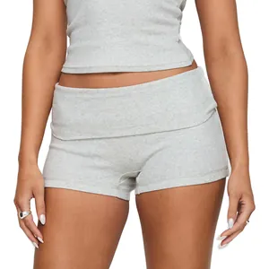 Close-up of gray ribbed yoga shorts featuring a stylish fold-over waistband design