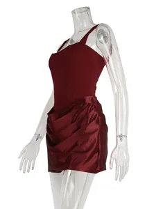 Elegant wine red strap mini dress with draped satin-like skirt for fashion parties.
