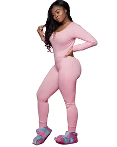 Detailed view of a pink long-sleeved jumpsuit with functional back flap for home wear