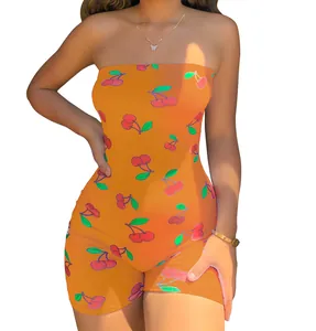 Detailed view of a sexy strapless tube top romper featuring a vibrant cherry print