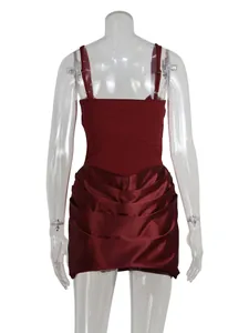 Detailed back view of a burgundy ruched satin mini dress with elegant strap design