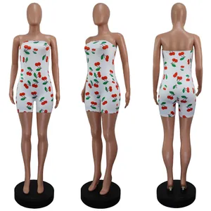 Detailed views of women's white cherry print tube top slim fit romper jumpsuit