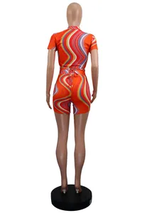 Back view detail of women's colorful wavy stripe two-piece set with crop top and shorts.