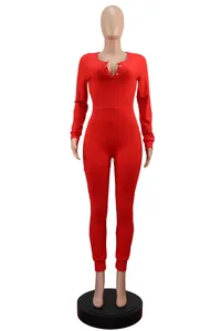 A detailed view of a red long-sleeve slim fit jumpsuit loungewear for women on a mannequin