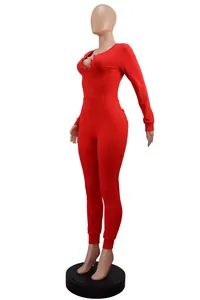 Side view of red long sleeve ribbed romper pajamas with button-down scoop neck