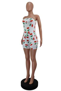Macro view of women's summer sexy tube top romper featuring a red cherry print