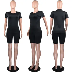 Comprehensive multi-angle view showing front, side, and back of the black athletic set.