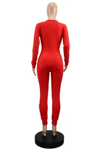 Back view of red long-sleeved pajama jumpsuit with functional buttoned butt flap