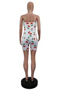 Back view of a white strapless slim fit bodysuit featuring a vibrant red cherry print