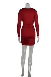 Detailed back view of a sexy red long sleeve bodycon mini dress featuring elegant ruched pleats