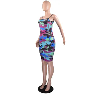 Side view detail of a vibrant camouflage bodycon camisole dress on a mannequin.