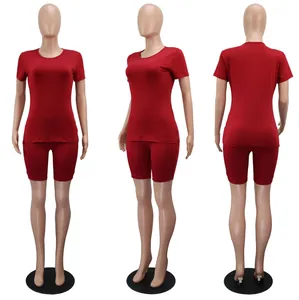 Front side and back view of a dark red two-piece sports set with t-shirt and slim fit shorts