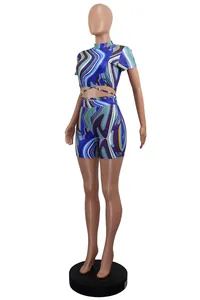 Detailed side view of two-piece set with abstract print and waist tie-up detail