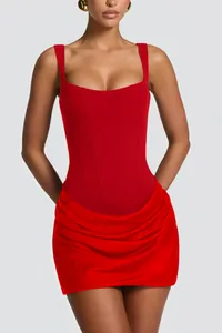 Red sleeveless corset style mini dress with draped skirt detail for a slim fit