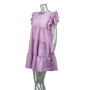 Side view of a lavender summer dress with ruffle sleeves and tiered skirt details