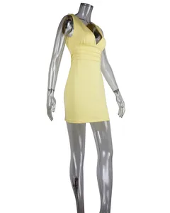 Yellow deep V-neck sleeveless bodycon dress with ruched waist on mannequin