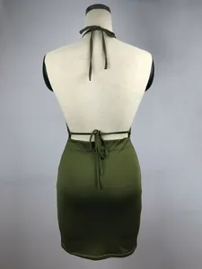 Back view of an olive green halter dress with tie-back detailing on a mannequin