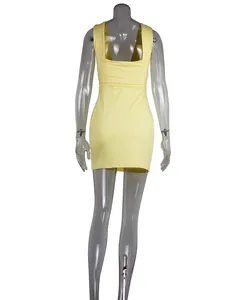 Back view of a sleek yellow sleeveless ruched bodycon dress on a transparent mannequin
