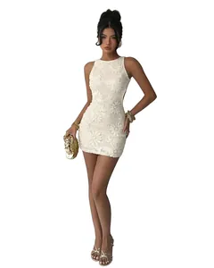 Detailed view of white lace embroidered sequin dress with sexy open back for parties