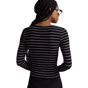 Back view showing the fine texture of a black and white striped ribbed long sleeve top