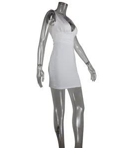 Side view of a white sleeveless deep V-neck mini dress on a clear mannequin.