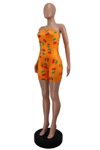 Slim-fit orange strapless romper featuring an all-over vibrant cherry print design