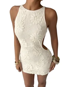 Close-up of a white lace embroidered sequin mini dress with backless cut-out design