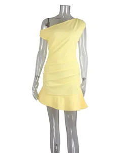 Elegant yellow one-shoulder ruched dress with irregular ruffled hem detail.
