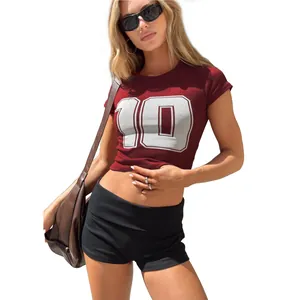 Detail view of black slim fit cotton yoga shorts with a stylish fold-over waist design
