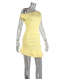 Vibrant yellow one-shoulder ruched bodycon mini dress with an irregular ruffle hemline