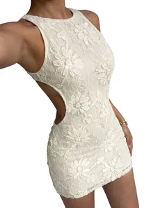 Detail of white lace sequin mini dress featuring elegant backless design