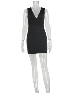 Detail of a black sleeveless deep V-neck ruched bodycon mini dress on mannequin