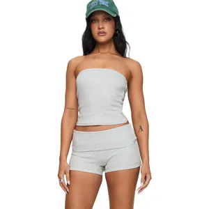 Detail view of the grey cotton slim fit tube top and matching folded waist yoga shorts