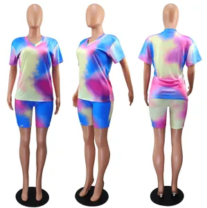 Multi-angle views of a colorful tie-dye two-piece set featuring a V-neck top and biker shorts
