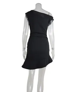 Rear view of a black one-shoulder dress with ruched waist and asymmetrical ruffled hem.