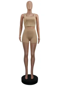 Two-piece ribbed beige lounge set with crop top camisole and high waist shorts