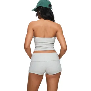 Detailed back view of a women's grey ribbed tube top and athletic yoga shorts set