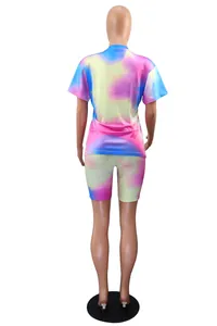 Detailed back view of a vibrant tie-dye t-shirt and shorts two-piece set for women