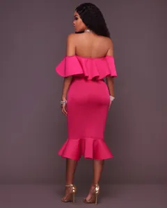 Back view of pink off-the-shoulder mermaid dress with elegant ruffles and fishtail hem