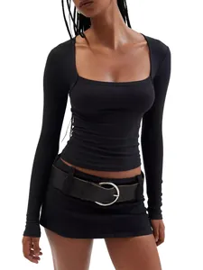 Chic black ribbed long-sleeve top with low square neck for a sexy slim fit silhouette