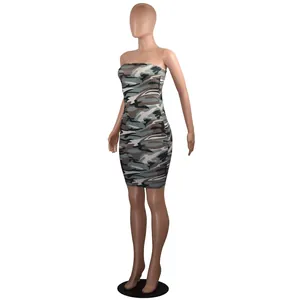 Full display of the digital camouflage print tube dress on a brown display mannequin