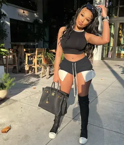 Fashionable black ribbed tank top and drawstring shorts with side slits for summer streetwear